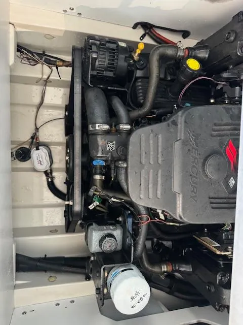Slide: The Image of 2007 Sea Ray 230 Select engine compartment with Mercury engine. - 8