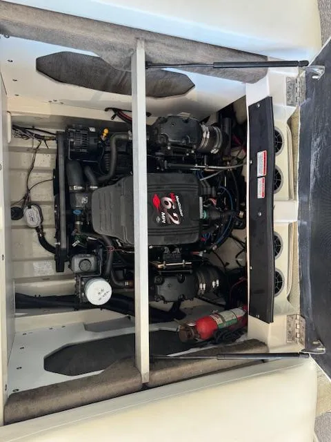 Slide: The Image of Engine compartment of a 2007 Sea Ray 230 Select boat. - 9
