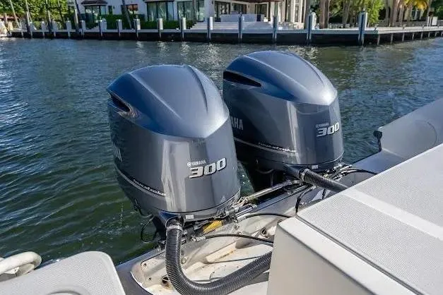 Slide: The Image of Twin Yamaha 300 outboard engines on a 2010 Edgewater 318CC boat. - 17