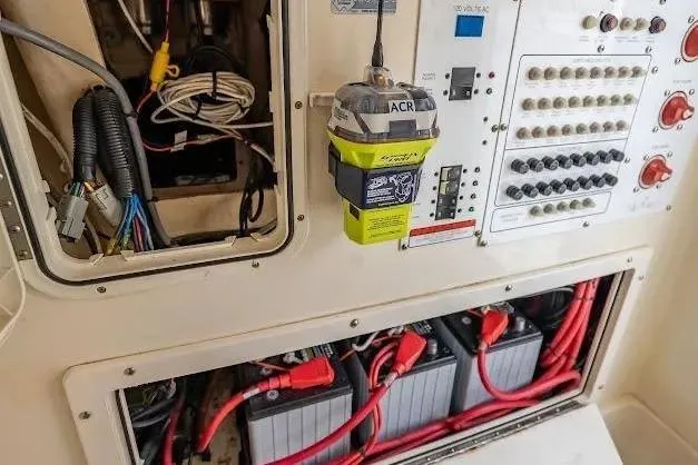 Slide: The Image of Electrical panel and battery setup on a 2010 Edgewater 318CC boat. - 18