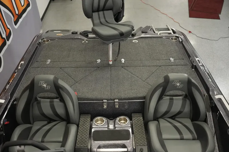 Slide: The Image of 2025 Bass Cat Puma STS boat dashboard with advanced navigation system and controls. - 12