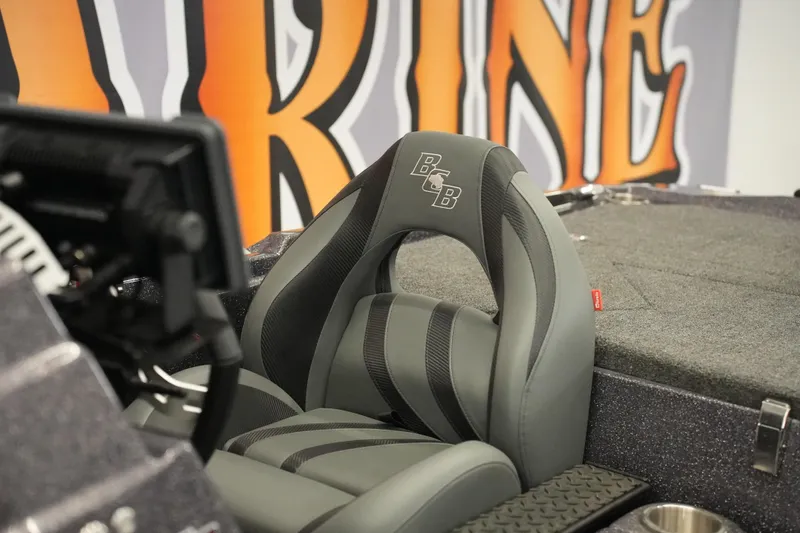 Slide: The Image of 2025 Bass Cat Puma STS boat dashboard with advanced navigation and control systems. - 13