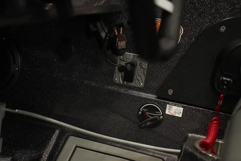 Slide: The Image of 2025 Bass Cat Puma STS interior with sleek, modern seating and dashboard details. - 14