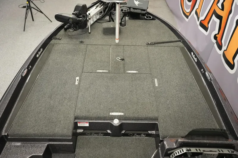 Slide: The Image of 2025 Bass Cat Puma STS dashboard with control panel and safety features. - 15