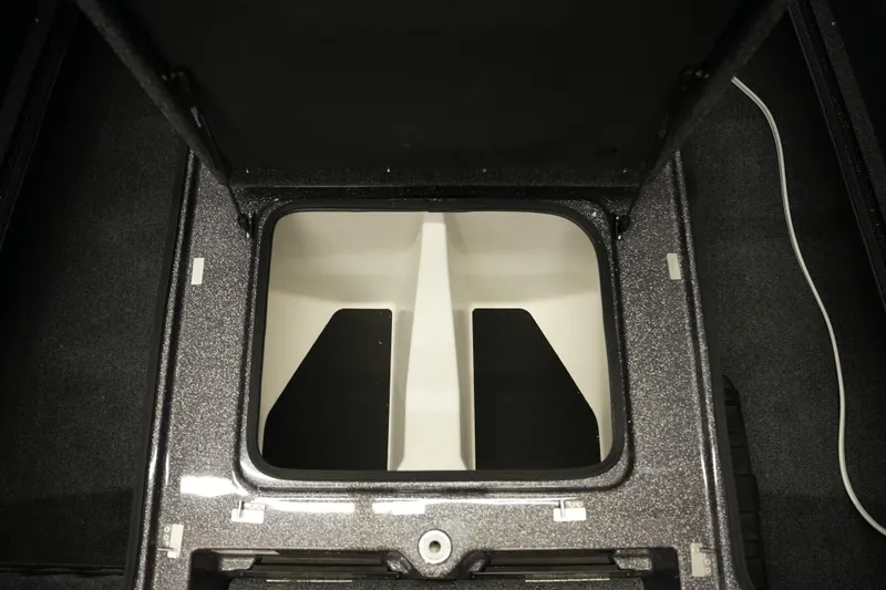 Slide: The Image of 2025 Bass Cat Puma STS boat interior with seating and storage compartments. - 20