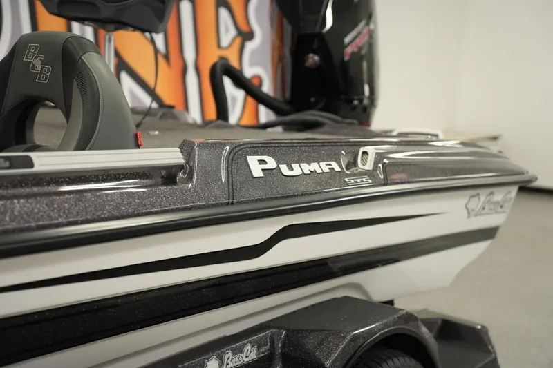 Slide: The Image of 2025 Bass Cat Puma STS boat interior with sleek seating and modern design. - 4