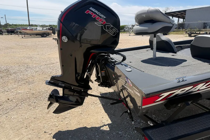 Slide: The Image of 2018 Tracker Pro Team 190 TX boat with Mercury Pro XS engine in outdoor setting. - 3