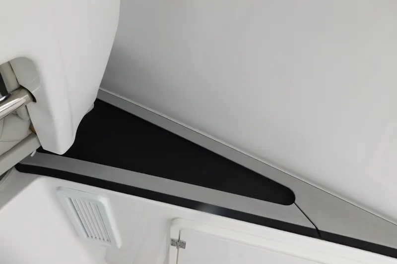 Slide: The Image of Interior detail of 2023 Pursuit OS 325 Offshore boat, showcasing sleek design elements. - 33
