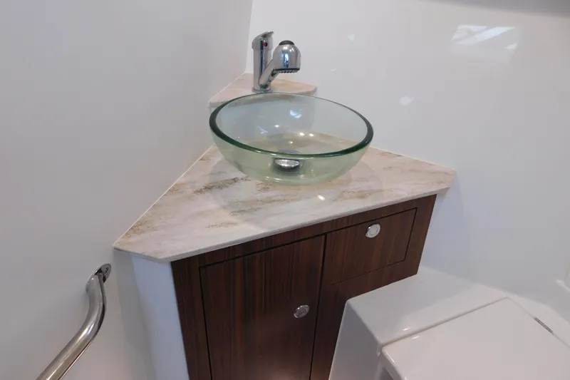 Slide: The Image of Modern bathroom sink in 2023 Pursuit OS 325 Offshore boat. - 50
