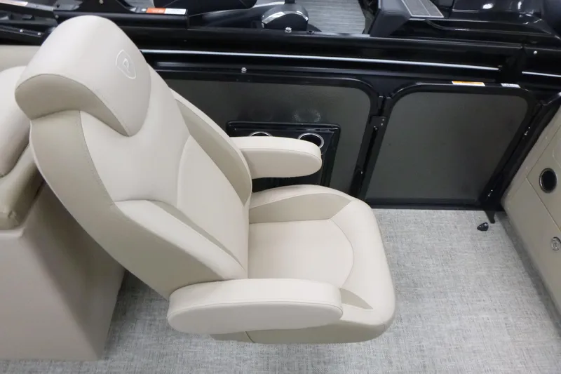 Slide: The Image of Luxurious beige seating in 2026 Premier 230 Sunsation RF - CL boat interior. - 10