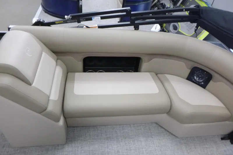 Slide: The Image of Luxurious seating on 2026 Premier 230 Sunsation RF - CL pontoon boat, featuring beige upholstery. - 13