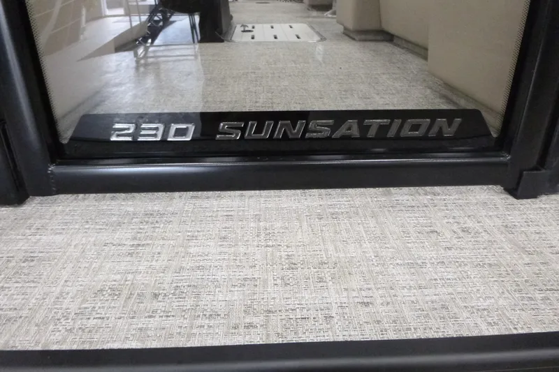 Slide: The Image of 2026 Premier 230 Sunsation RF - CL boat interior with logo detail. - 14