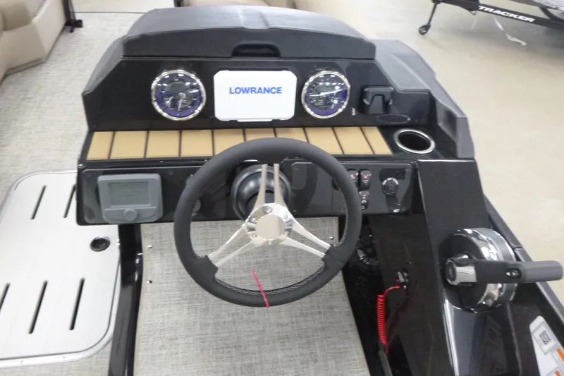 Slide: The Image of Steering console of 2026 Premier 230 Sunsation RF - CL with Lowrance display. - 9