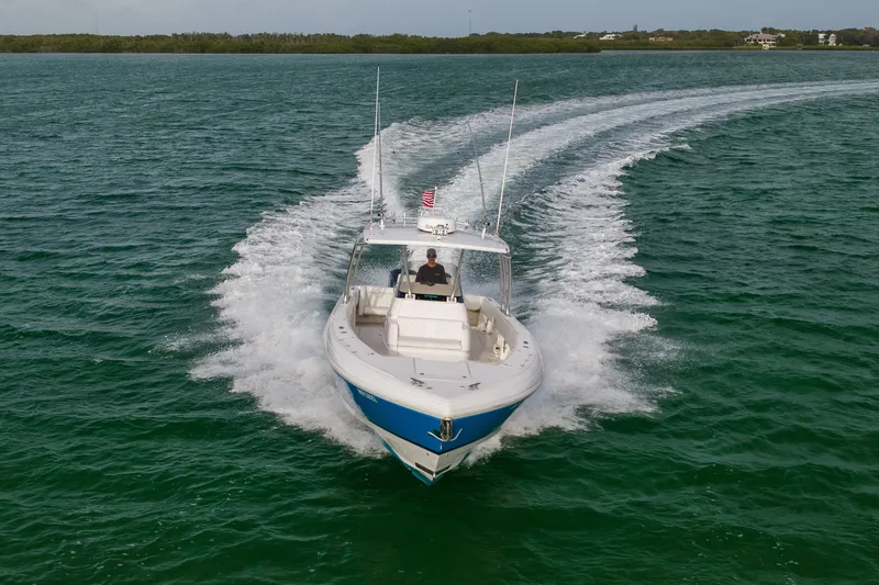 Slide: The Image of Intrepid 370 Center Console boat cruising on open water, 2011 model. - 10