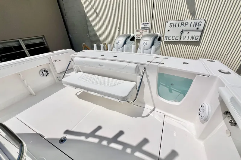 Slide: The Image of 2026 Stamas 33T Aventura boat deck with seating and storage compartments. - 8