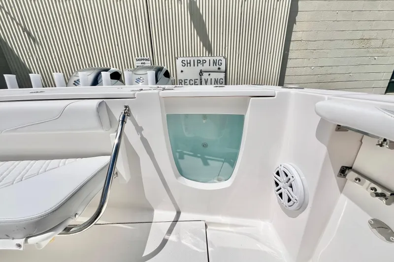 Slide: The Image of 2026 Stamas 33T Aventura boat interior with seating, livewell, and speaker. - 9
