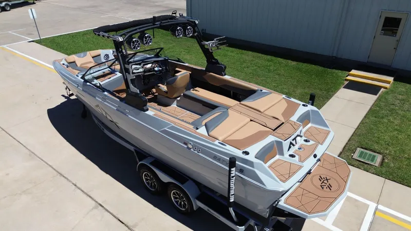 Slide: The Image of 2024 ATX TYPE S boat with sleek design and luxurious features. - 12