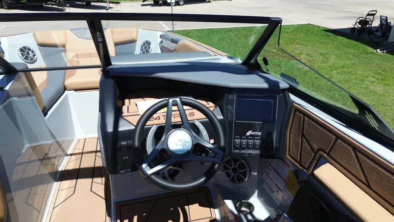 Slide: The Image of Interior of 2024 ATX TYPE S boat with steering wheel and dashboard. - 27