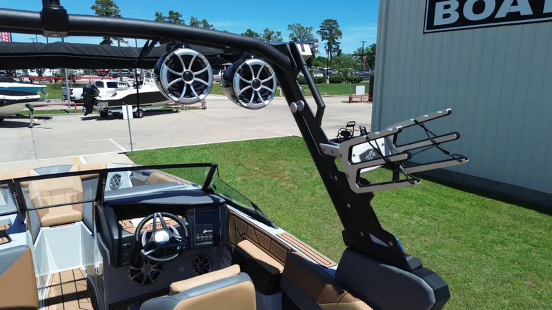 Slide: The Image of 2024 ATX TYPE S boat with speakers and steering console. - 29