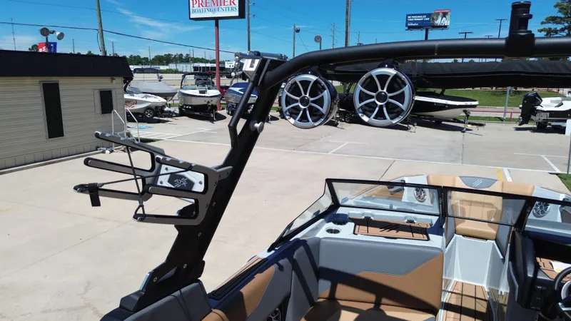 Slide: The Image of 2024 ATX TYPE S boat with speakers and wakeboard rack. - 30