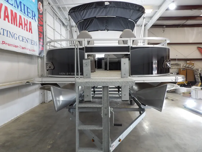 Slide: The Image of 2026 Avalon Venture 85 Rear Fish boat in showroom. - 13