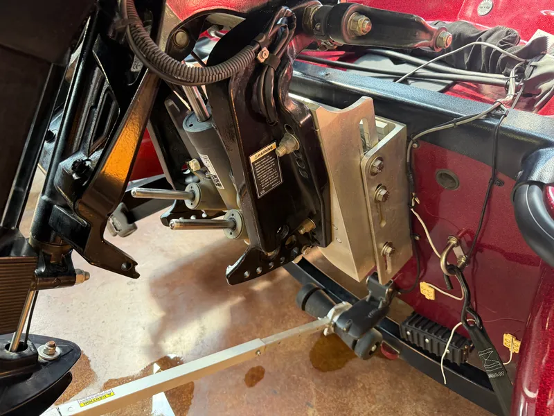 Slide: The Image of Close-up of the engine area of a 2010 Triton 190 Escape boat. - 17