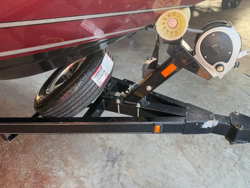 Slide: The Image of Triton 190 Escape 2010 boat trailer with spare tire. - 20