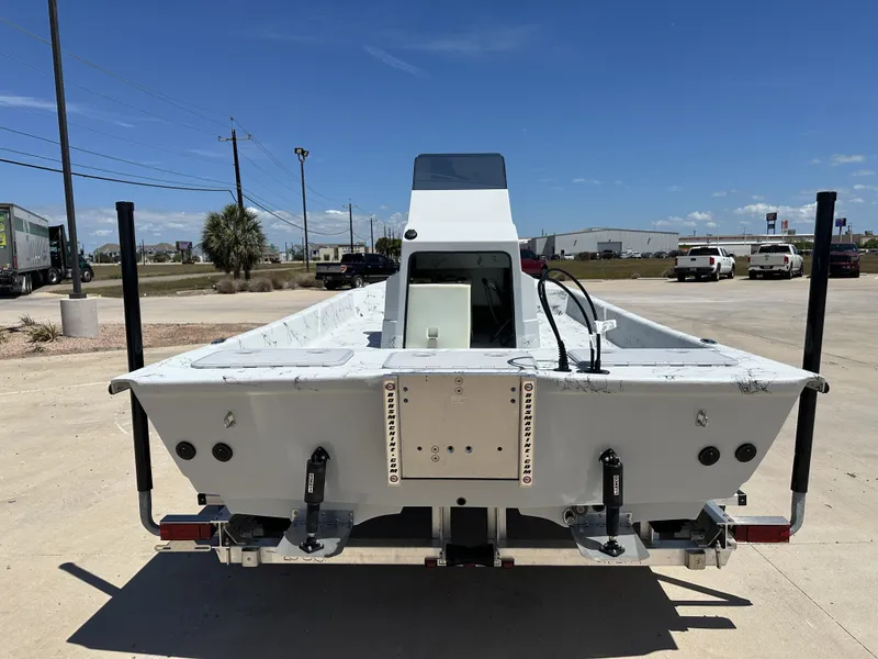 Slide: The Image of 2026 Shoalwater 20' Catamaran on a parking lot. - 10