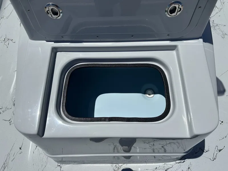 Slide: The Image of Open storage compartment on a 2026 Shoalwater 20' Catamaran. - 15