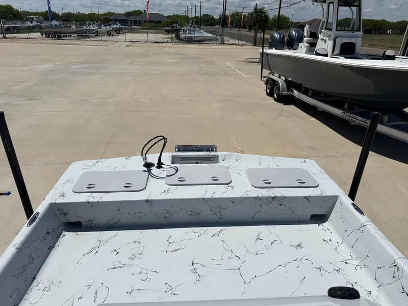 Slide: The Image of 2026 Shoalwater 20' Catamaran on a parking lot. - 16