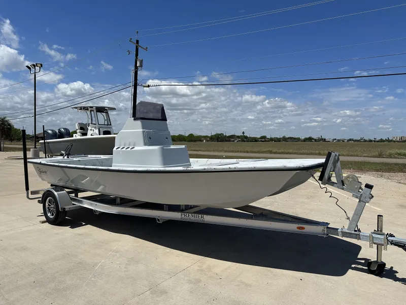 Slide: The Image of 2026 Shoalwater 20' Catamaran on trailer under blue sky. - 7