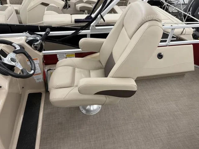 Slide: The Image of Interior of 2019 Sun Tracker SportFish 22 DLX with beige captain's chair. - 13