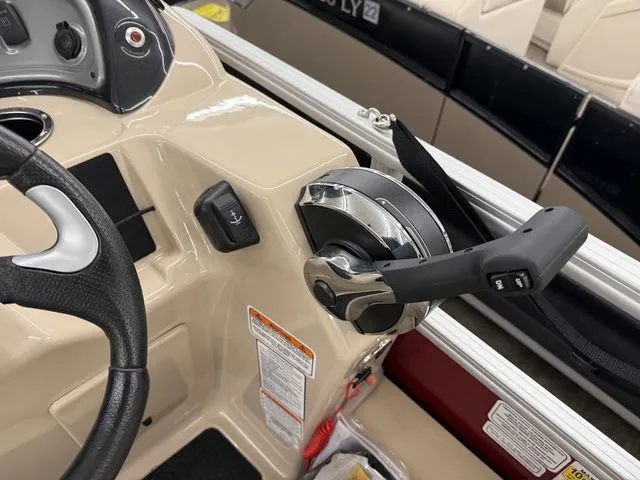 Slide: The Image of Control console of a 2019 Sun Tracker SportFish 22 DLX pontoon boat. - 17