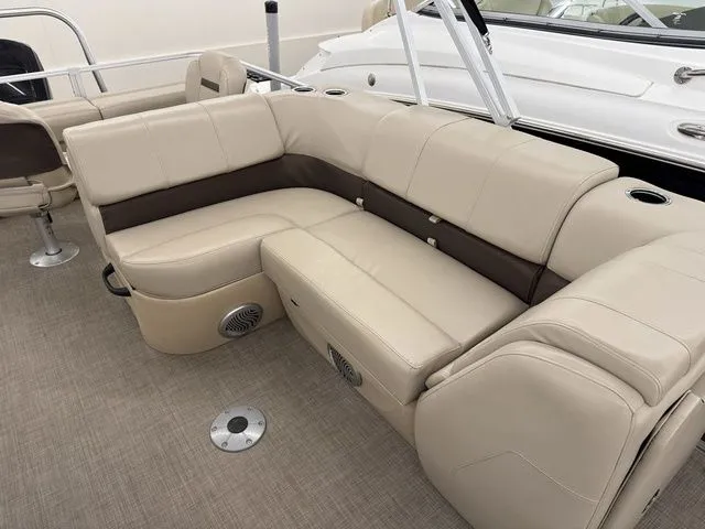 Slide: The Image of Interior of 2019 Sun Tracker SportFish 22 DLX with beige seating. - 18