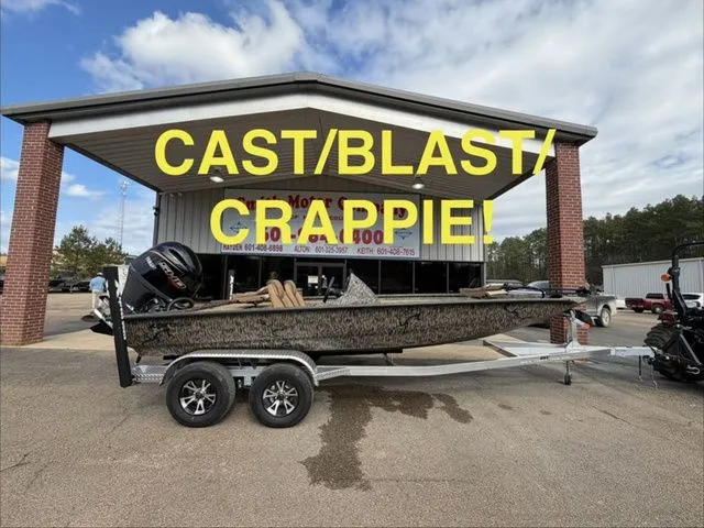 The Image of Xpress H20C Crappie 2026 boat in front of building with yellow text. - 1