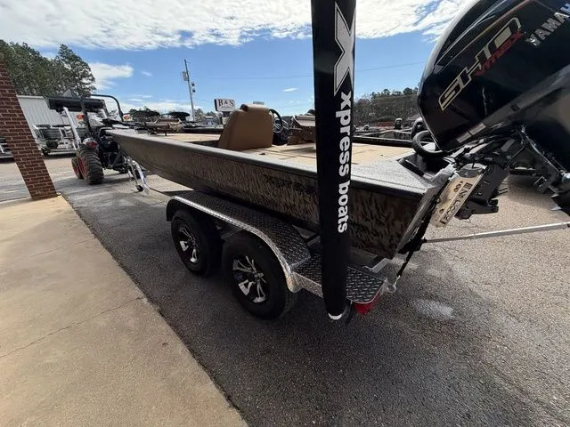 Slide: The Image of 2026 Xpress H20C Crappie boat on trailer, side view. - 10