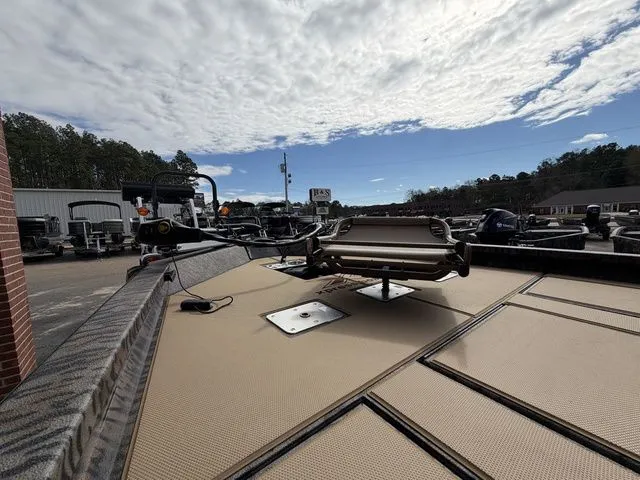 Slide: The Image of 2026 Xpress H20C Crappie boat on a lot under a cloudy sky. - 15