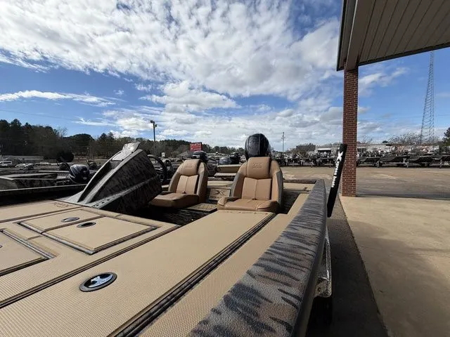Slide: The Image of 2026 Xpress H20C Crappie boat with two seats outdoors. - 19
