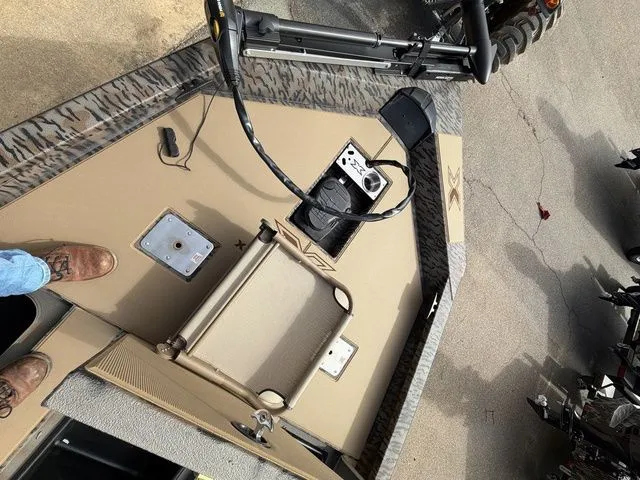 Slide: The Image of Interior view of 2026 Xpress H20C Crappie with console and seat. - 20