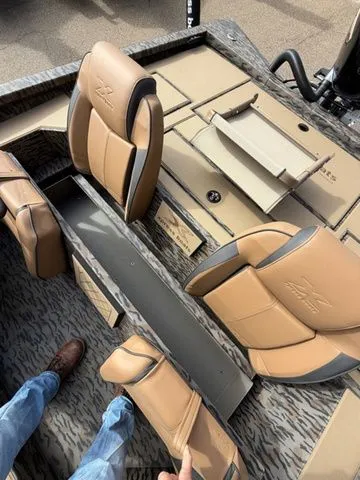 Slide: The Image of Interior of 2026 Xpress H20C Crappie with beige seats. - 23