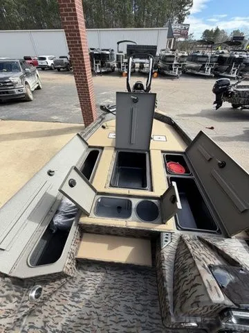 Slide: The Image of 2026 Xpress H20C Crappie boat with storage and fishing gear. - 25