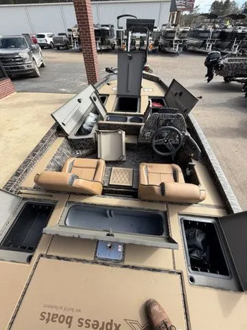 Slide: The Image of Interior of 2026 Xpress H20C Crappie boat with storage and seating. - 34