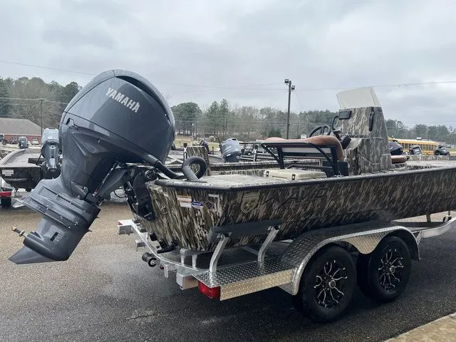 Slide: The Image of Avid 22 Rogue 2026 boat with Yamaha engine on trailer. - 11