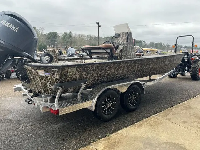 Slide: The Image of Avid 22 Rogue 2026 boat on trailer with Yamaha engine. - 12