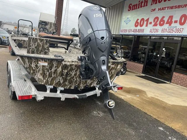 Slide: The Image of Avid 22 Rogue 2026 boat with outboard motor on trailer. - 14
