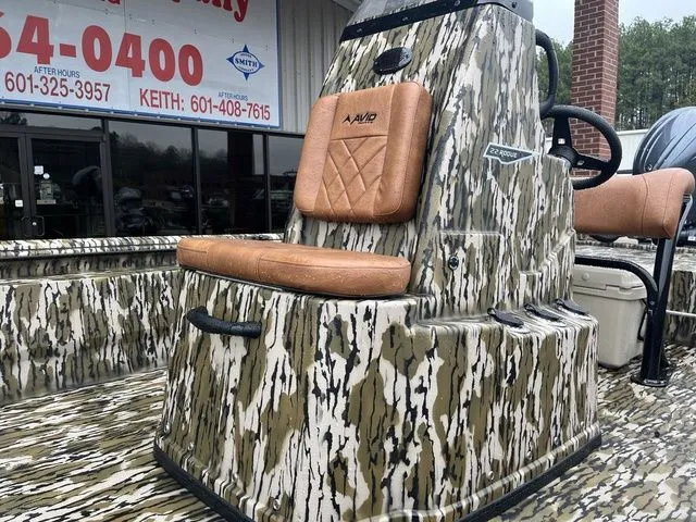 Slide: The Image of Avid 22 Rogue 2026 boat with camouflage pattern and cushioned seat. - 6