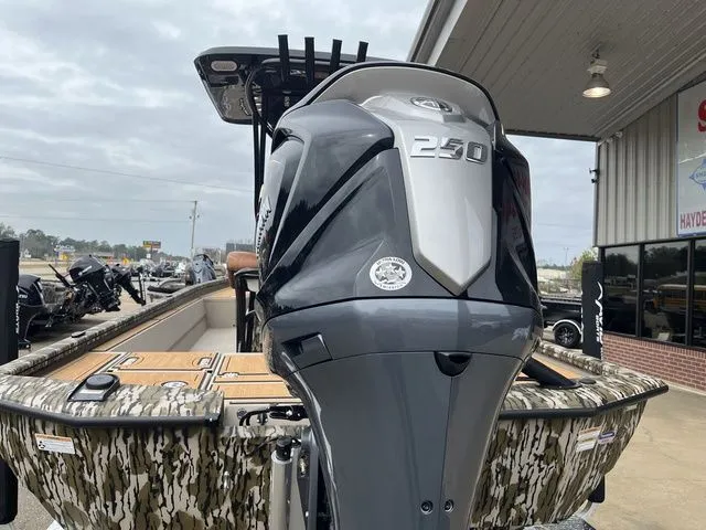 Slide: The Image of Avid 23 Mag 2025 boat with powerful outboard motor. - 11