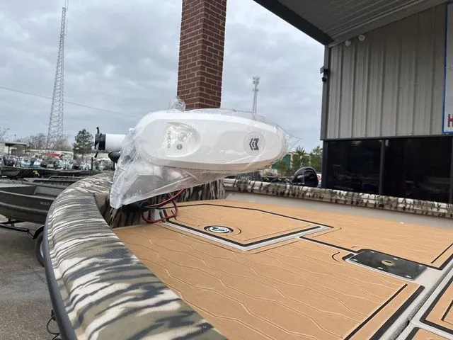 Slide: The Image of Avid 23 Mag 2025 boat with modern deck design. - 7