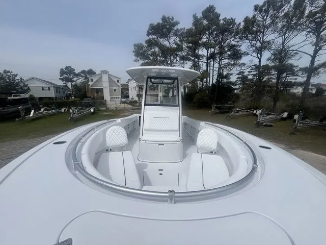 Slide: The Image of 2026 Sportsman Open 252 Center Console boat parked outdoors. - 7