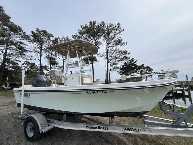 Slide: The Image of 2019 Parker 1801 Center Console boat on trailer, side view. - 2